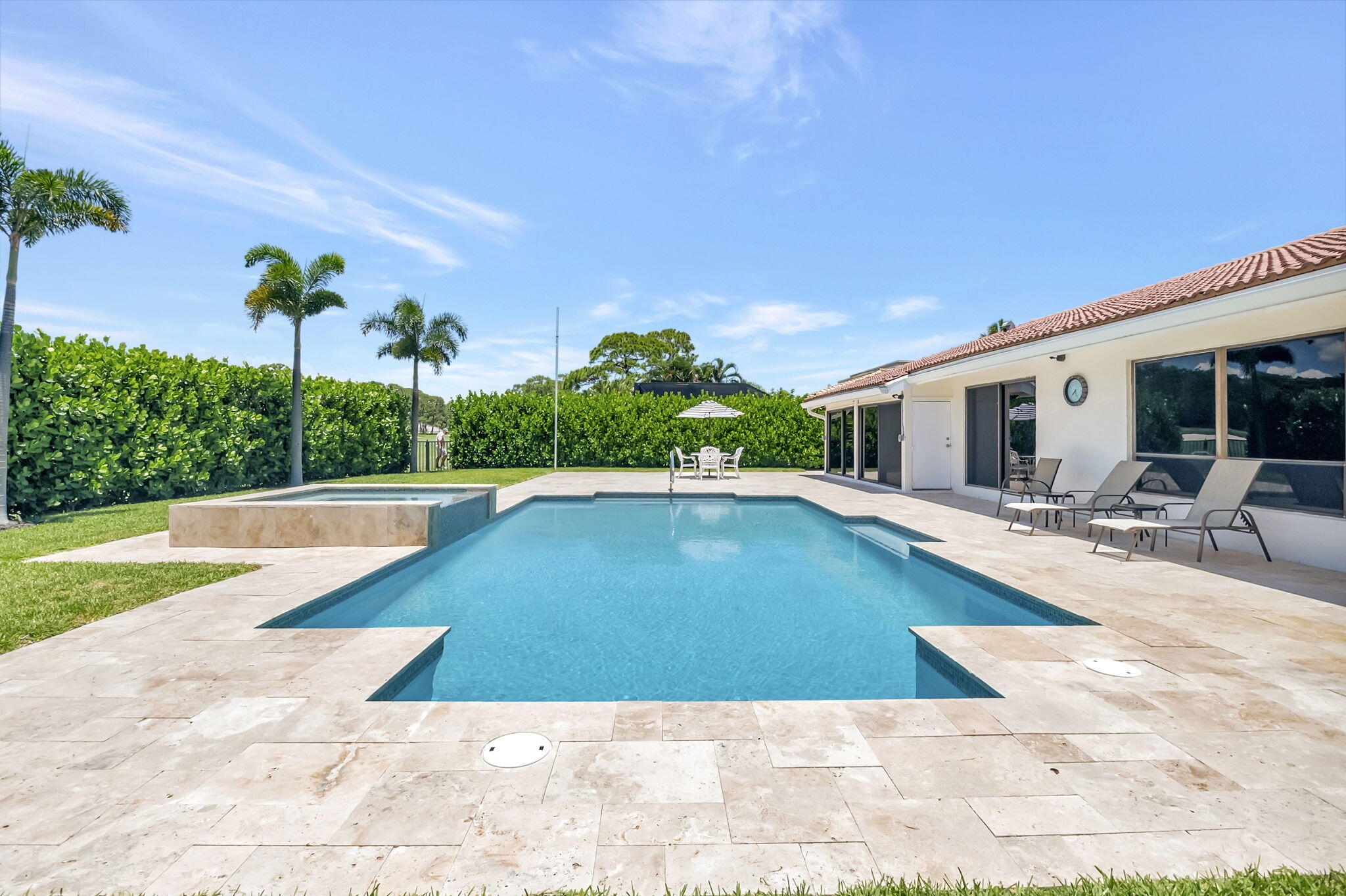 902 Foxpointe Circle Delray Beach, FL 33445 - Photo 38 of 43 a view of a swimming pool with a patio