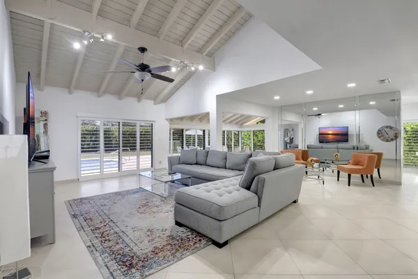 a living room with furniture and a table