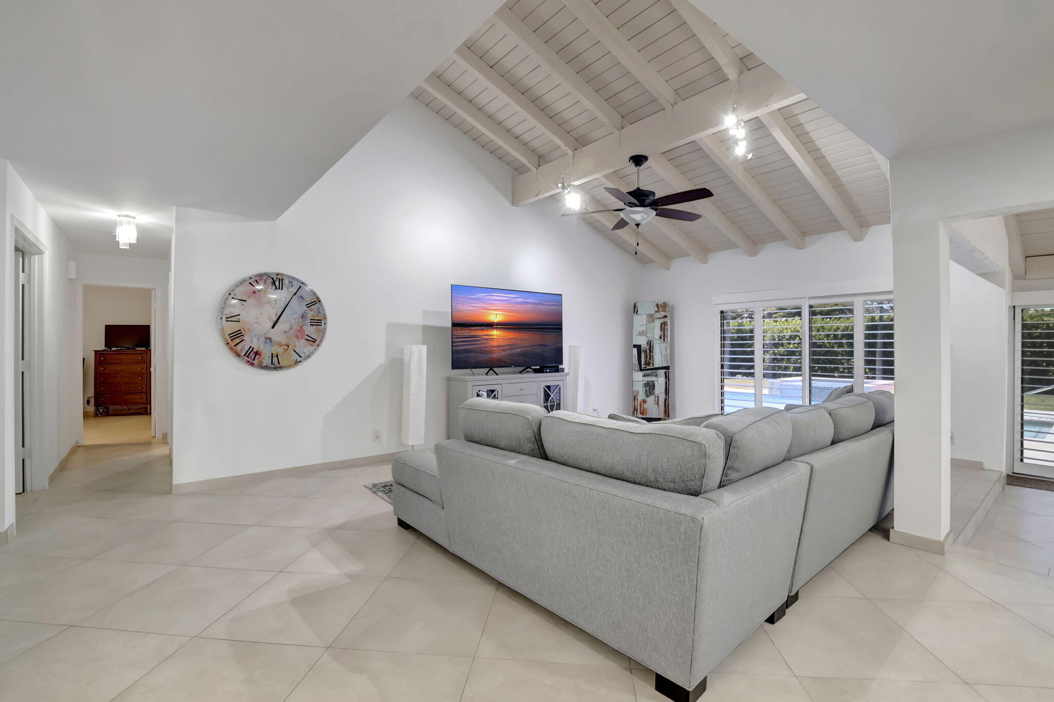 902 Foxpointe Circle Delray Beach, FL 33445 - Photo 8 of 43 a living room with furniture and a large window
