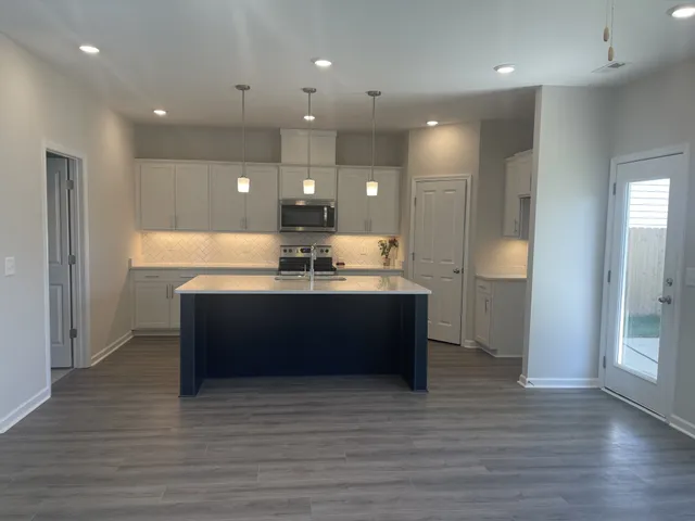 an empty room that has a window in it