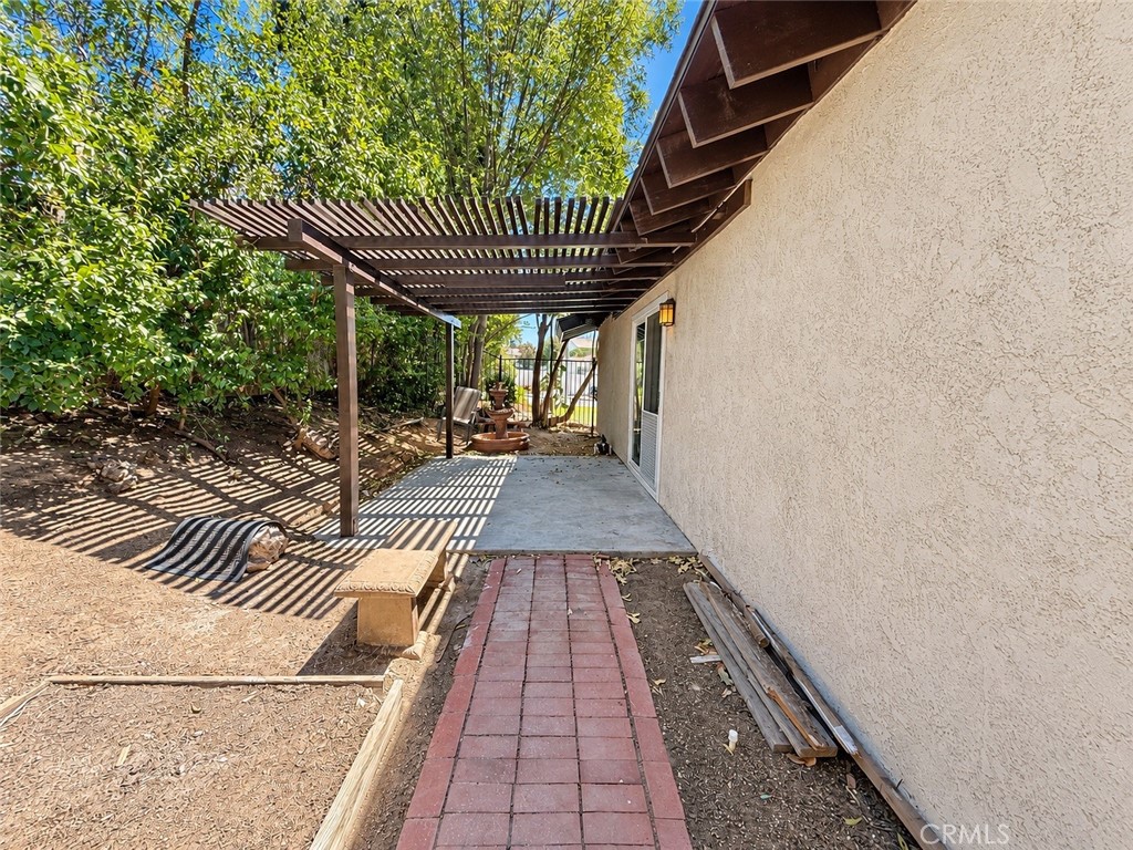 6257 Danbrook Drive Riverside, CA 92506 - Photo 43 of 43 Side of Backyard Patio Off of Dining Room