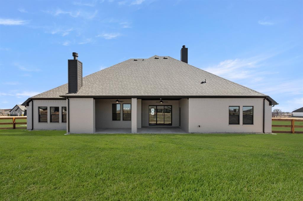 4867 Prairie Sky Lane DISH, TX 76247 - Photo 4 of 27 a front view of a house with a yard
