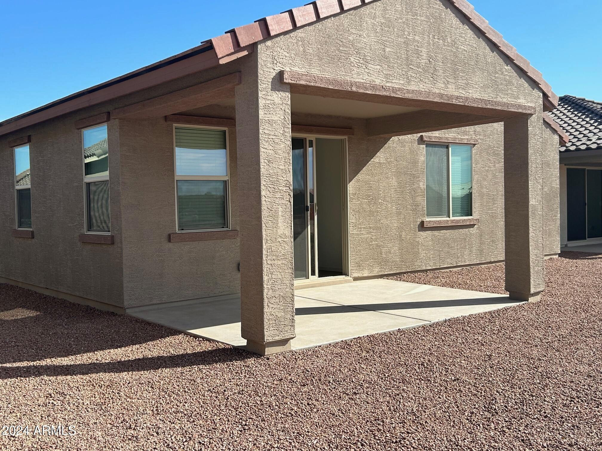 20520 North Candlelight Road Maricopa, AZ 85138 - Photo 18 of 18 a front view of a house