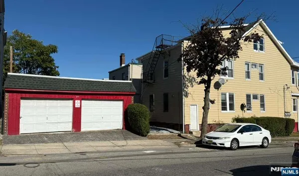 a car parked in front of a house