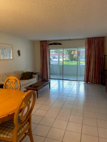 a view of a livingroom with furniture