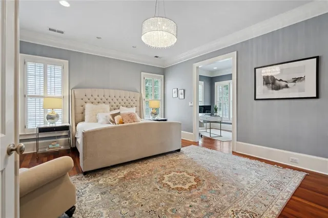 a bedroom with furniture and window