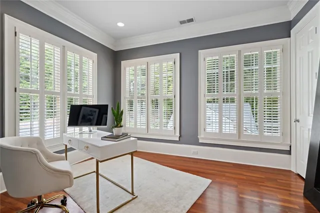 a workspace with furniture and a window