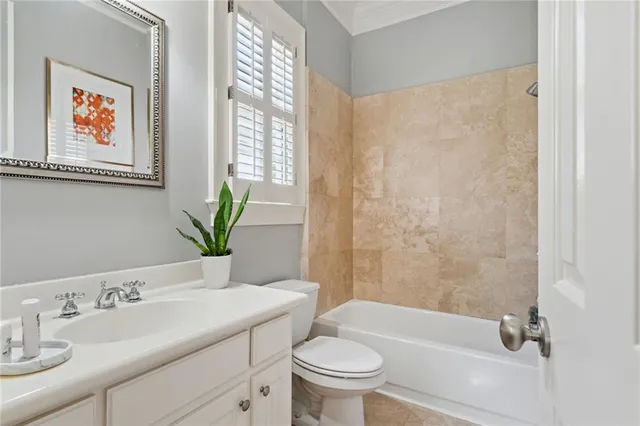 a bedroom with furniture and windows