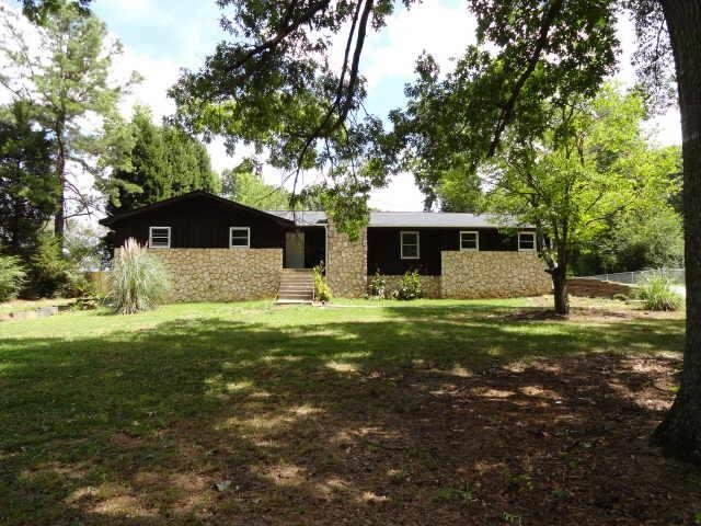 593 Rivers Road Fayetteville, GA 30214 - Photo 1 of 1 a front view of house with yard and green space