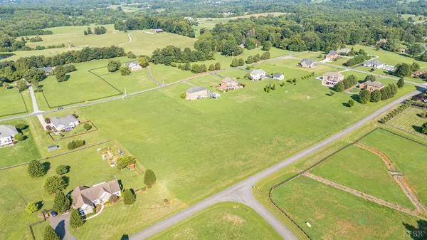 a view of a swimming pool and an outdoor space