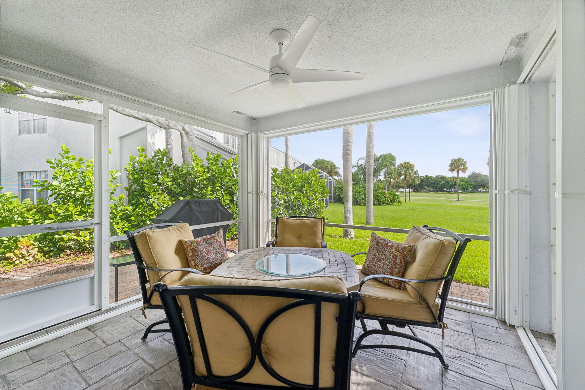 17094 Boca Club Boulevard, Unit 1 Boca Raton, FL 33487 - Photo 36 of 38 Screend Patio