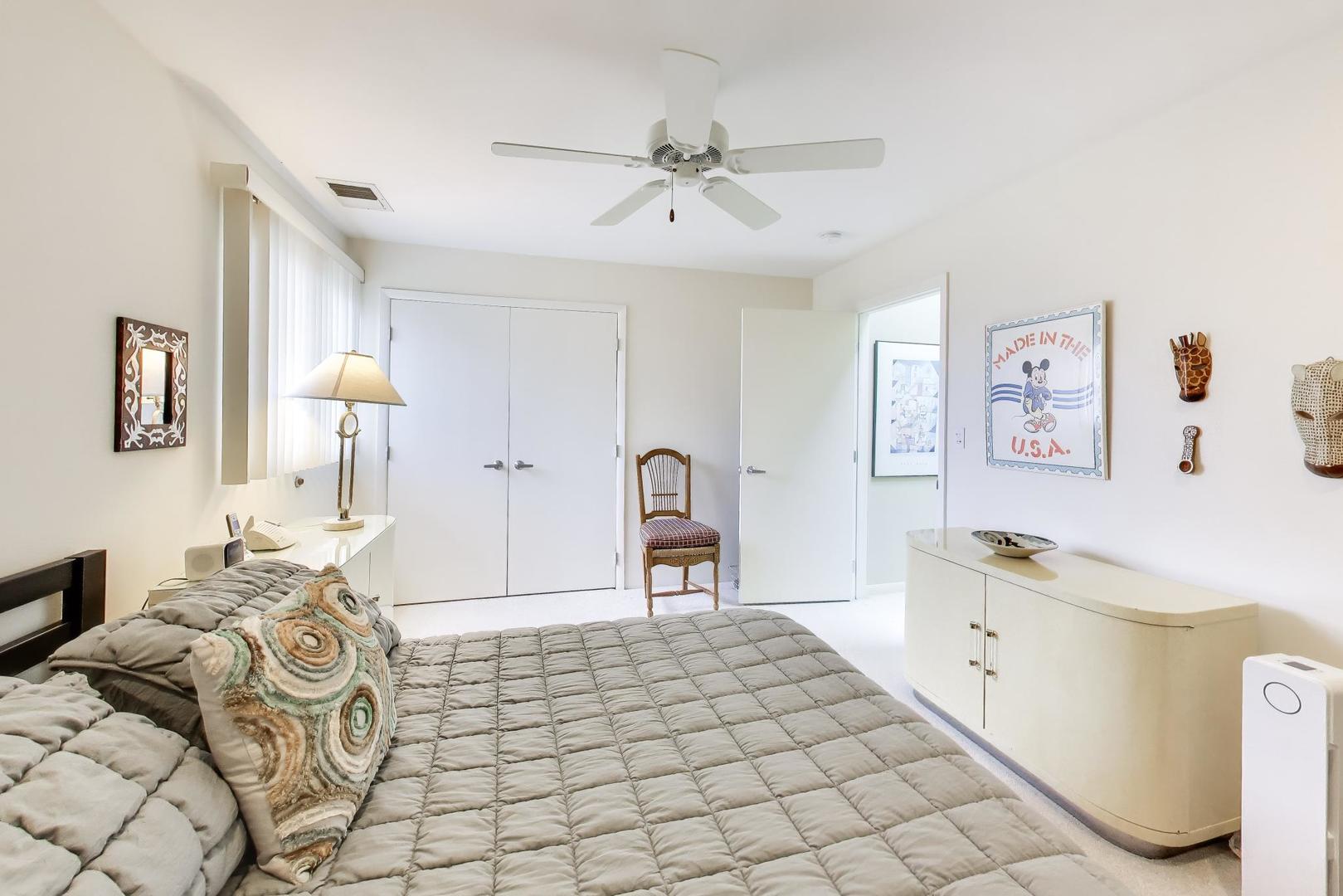 495 Milford Road Deerfield, IL 60015 - Photo 22 of 33 a bedroom with a bed and a table