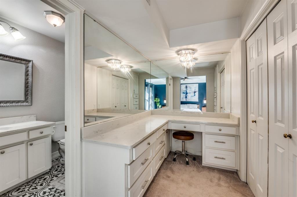 7544 Madeira Drive Fort Worth, TX 76112 - Photo 22 of 25 a spacious bathroom with a granite countertop sink mirror and
