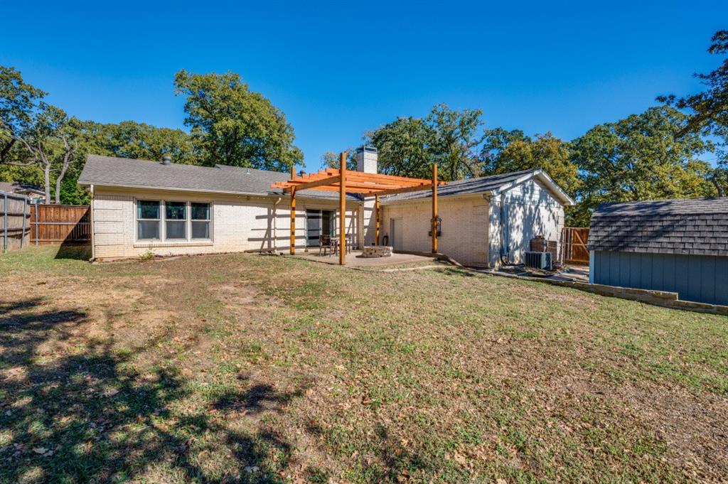 7544 Madeira Drive Fort Worth, TX 76112 - Photo 25 of 25 front view of a house with a yard