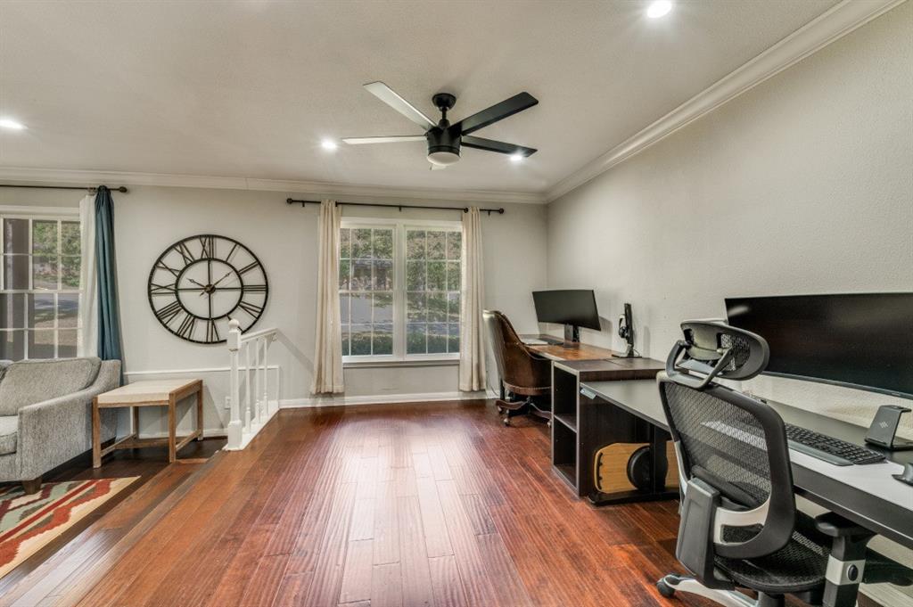 7544 Madeira Drive Fort Worth, TX 76112 - Photo 4 of 25 a workspace with wooden floor