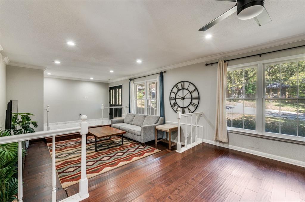 7544 Madeira Drive Fort Worth, TX 76112 - Photo 5 of 25 a living room with furniture and a large window