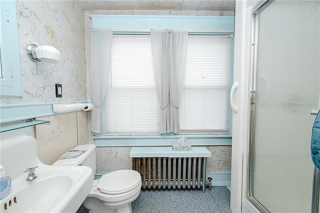 307 Allison Road Clymer, PA 15728 - Photo 16 of 22 a bathroom with a sink a toilet and a mirror