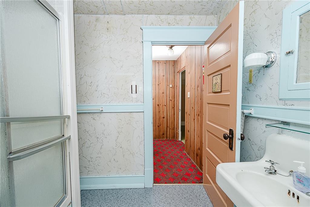 307 Allison Road Clymer, PA 15728 - Photo 17 of 22 a bathroom with a tub and a sink