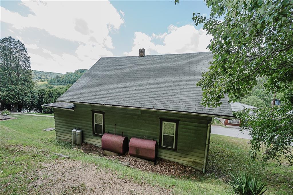 307 Allison Road Clymer, PA 15728 - Photo 20 of 22 an outdoor view of house with outdoor seating