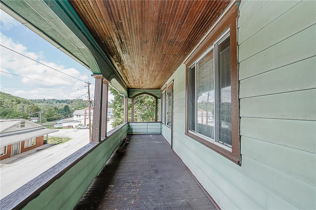 307 Allison Road Clymer, PA 15728 - Photo 3 of 22 a view of a narrow alley