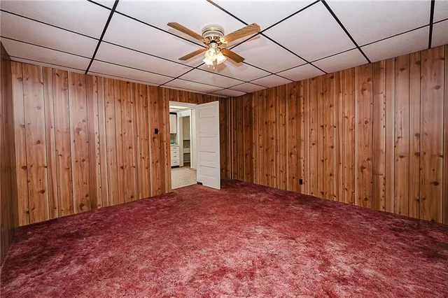 a view of a room with a large window