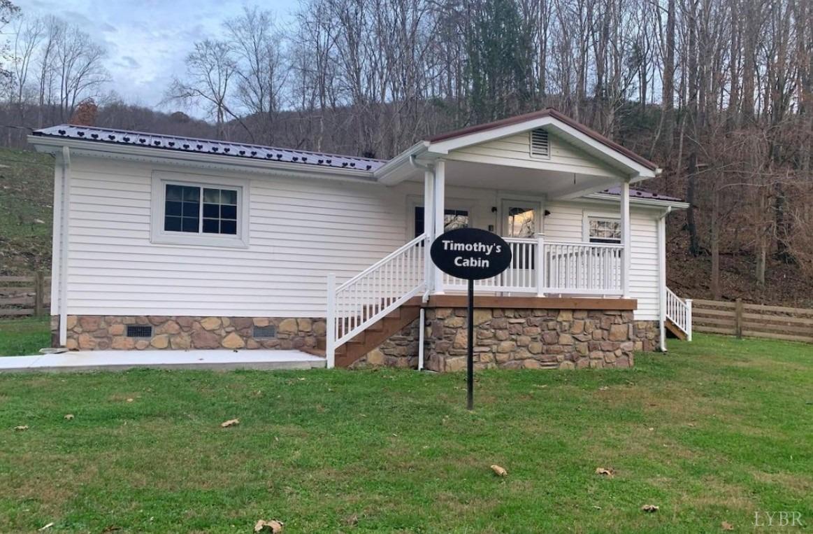 916 North Fork Road Amherst, VA 24521 - Photo 1 of 1 a front view of a house with a yard