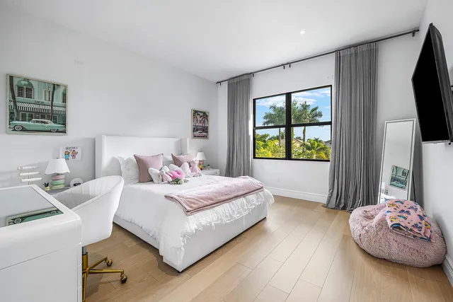 a large white tub sitting in a bathroom