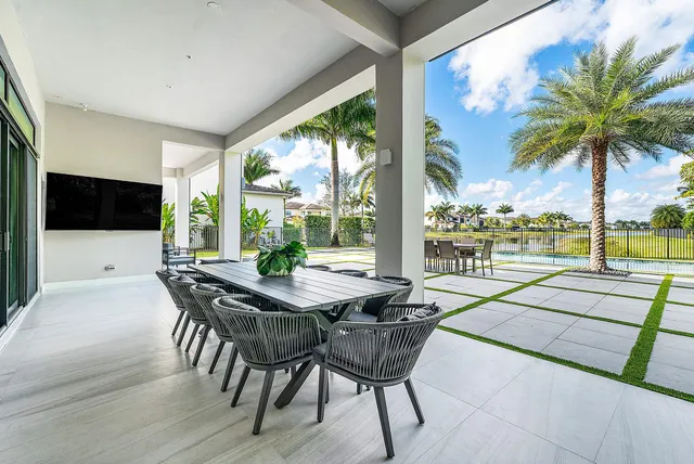 a view of a entryway door with outdoor seating