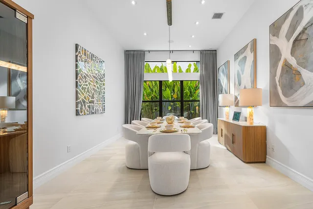 a living room with furniture and window