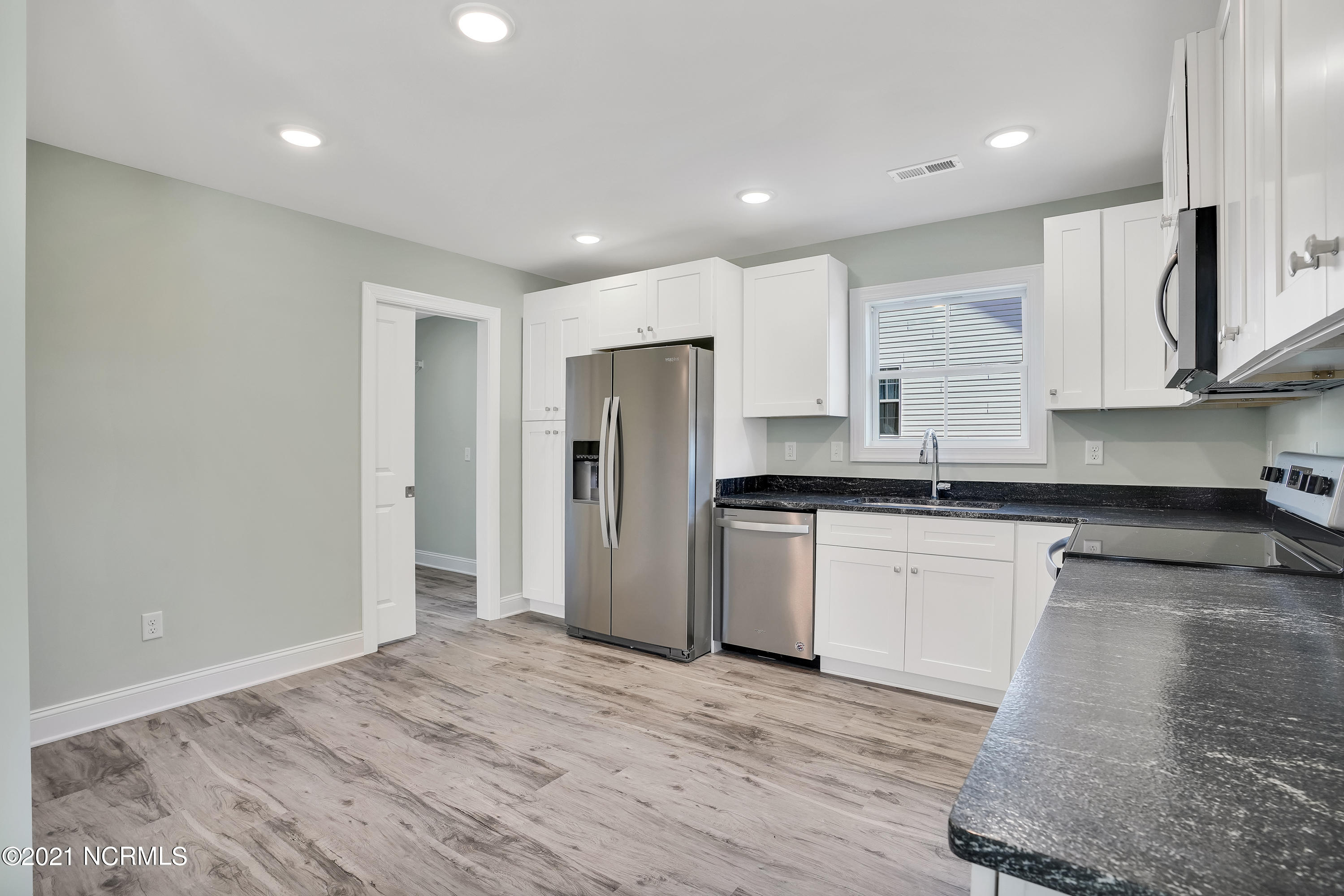 1097 Nicklaus Road Southport, NC 28461 - Photo 10 of 26 Photo not of actual home. Fridge is not included in price.