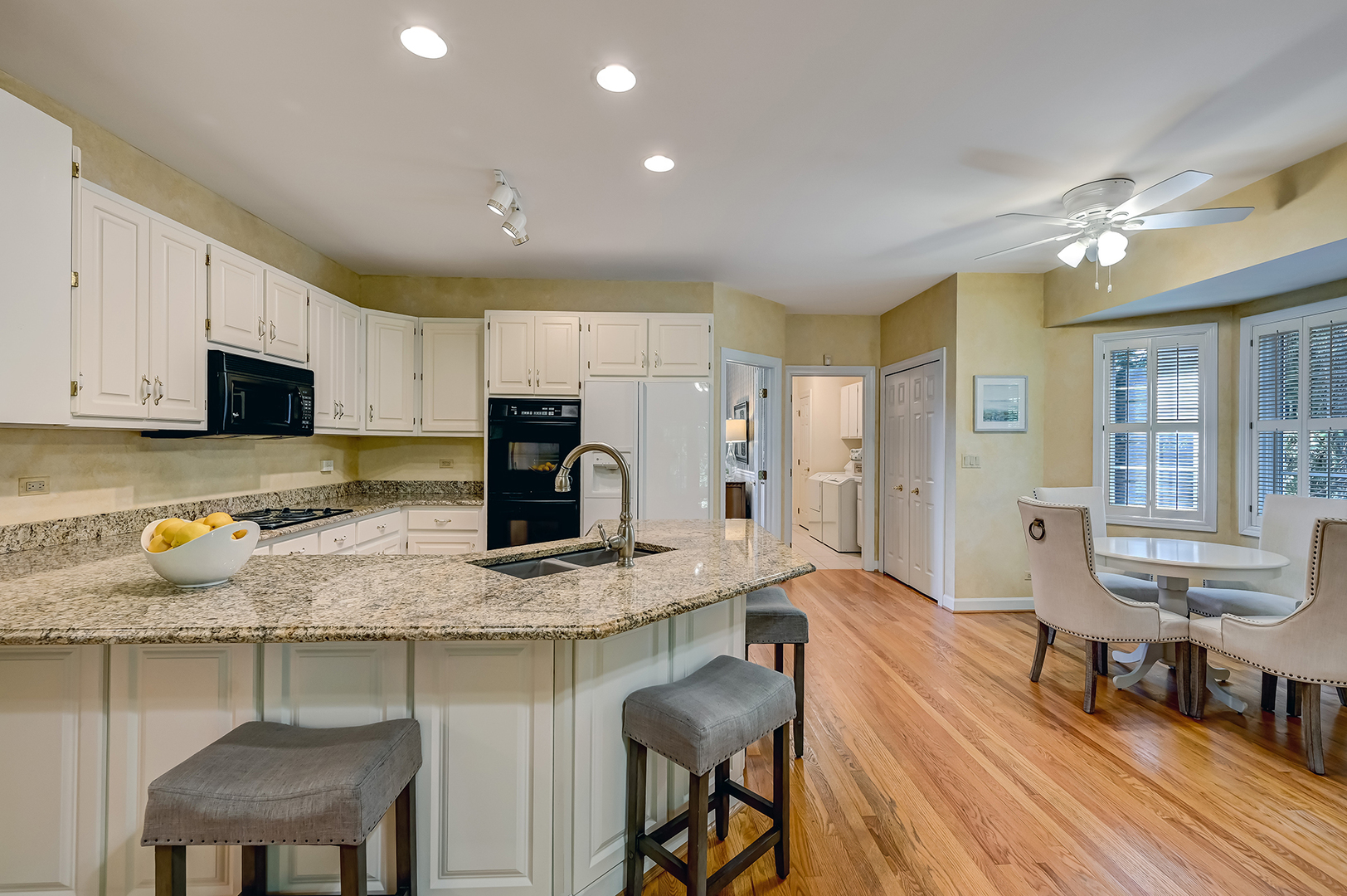 3 Berkshire Lane Burr Ridge, IL 60527 - Photo 13 of 40 a kitchen with sink cabinets and chair