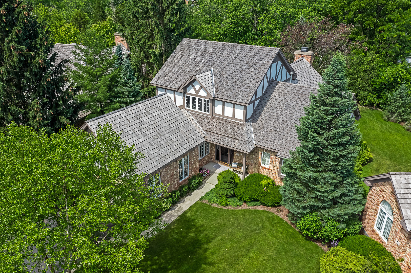 3 Berkshire Lane Burr Ridge, IL 60527 - Photo 2 of 40 a aerial view of a house next to a big yard and large trees
