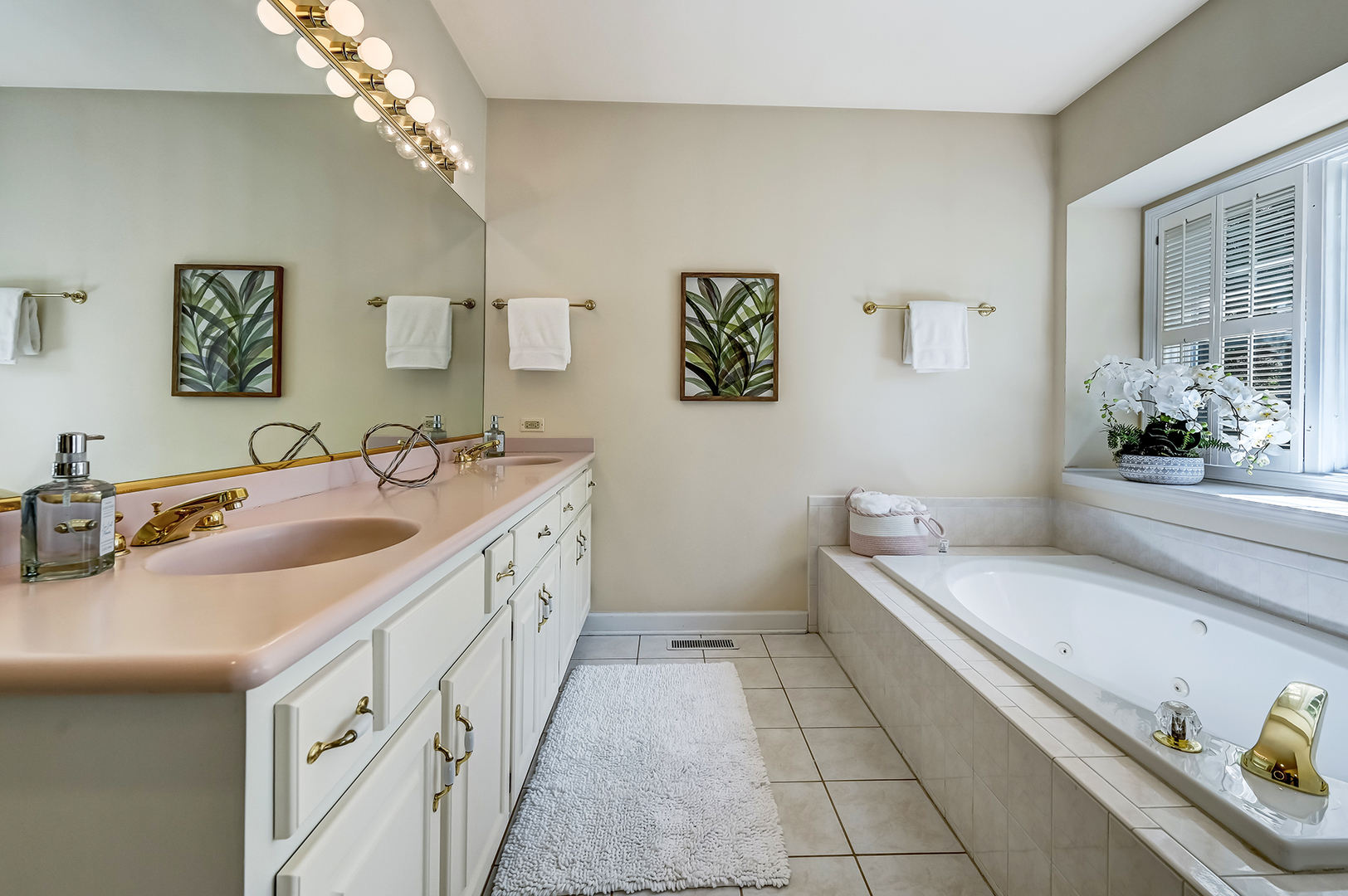 3 Berkshire Lane Burr Ridge, IL 60527 - Photo 21 of 40 a bathroom with a double vanity sink a toilet a mirror and shower