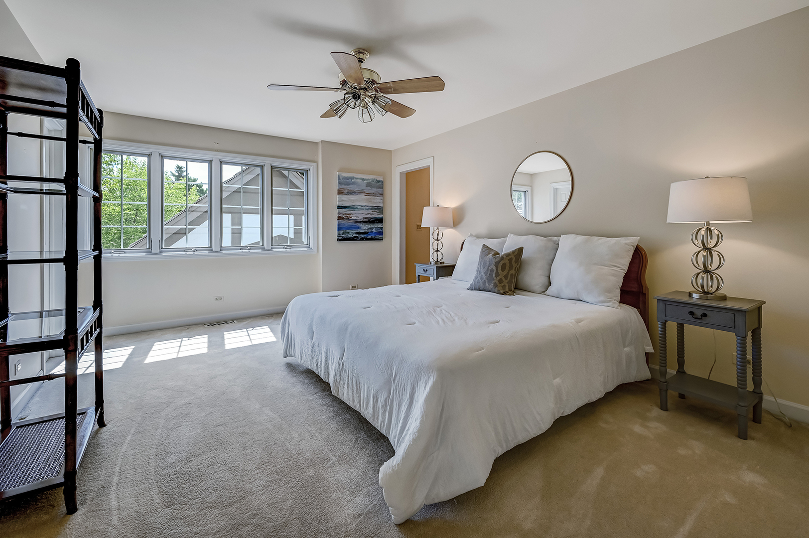 3 Berkshire Lane Burr Ridge, IL 60527 - Photo 23 of 40 a bedroom with a large bed and a window