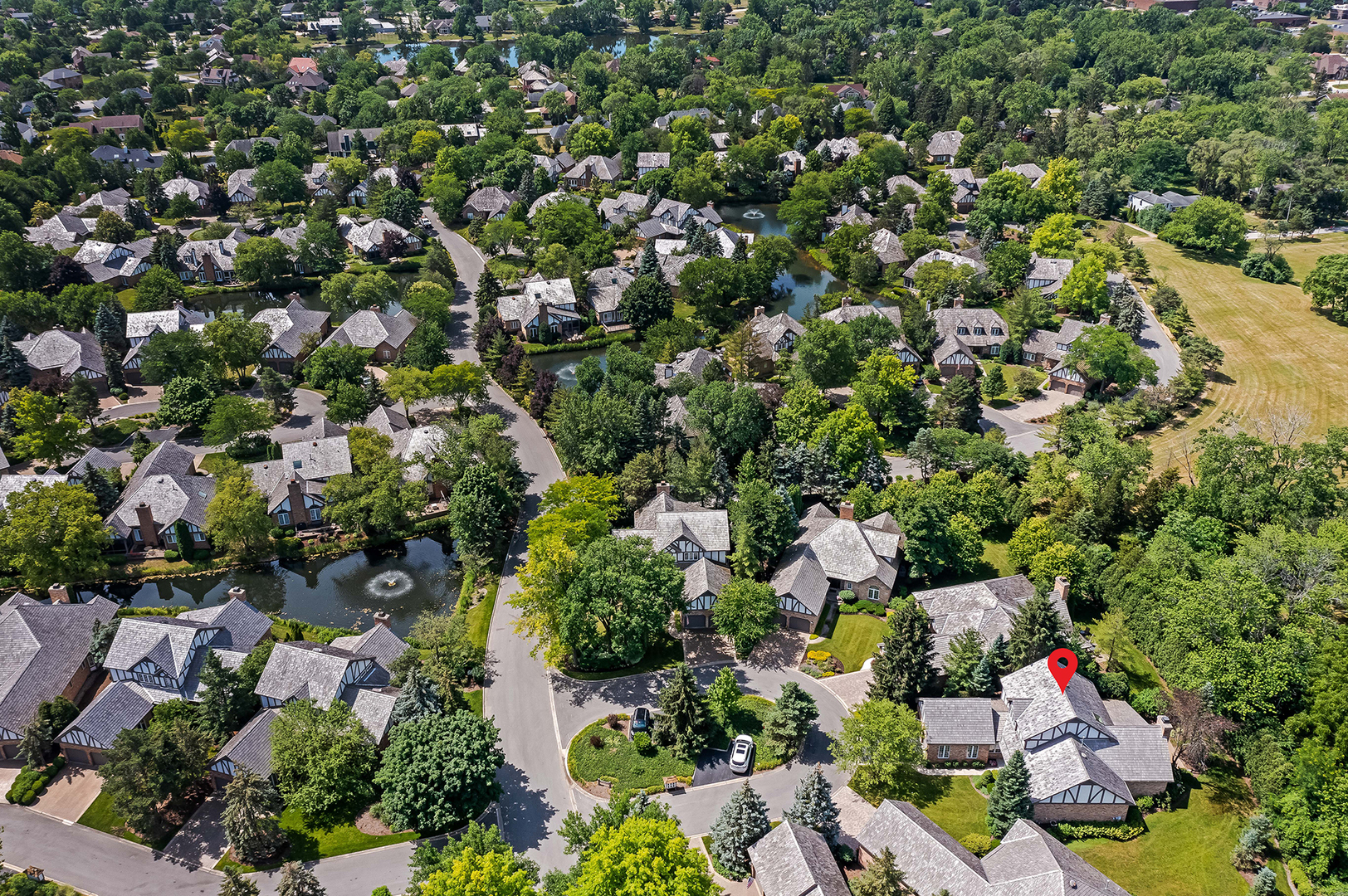 3 Berkshire Lane Burr Ridge, IL 60527 - Photo 36 of 40 an aerial view of residential houses with outdoor space and trees