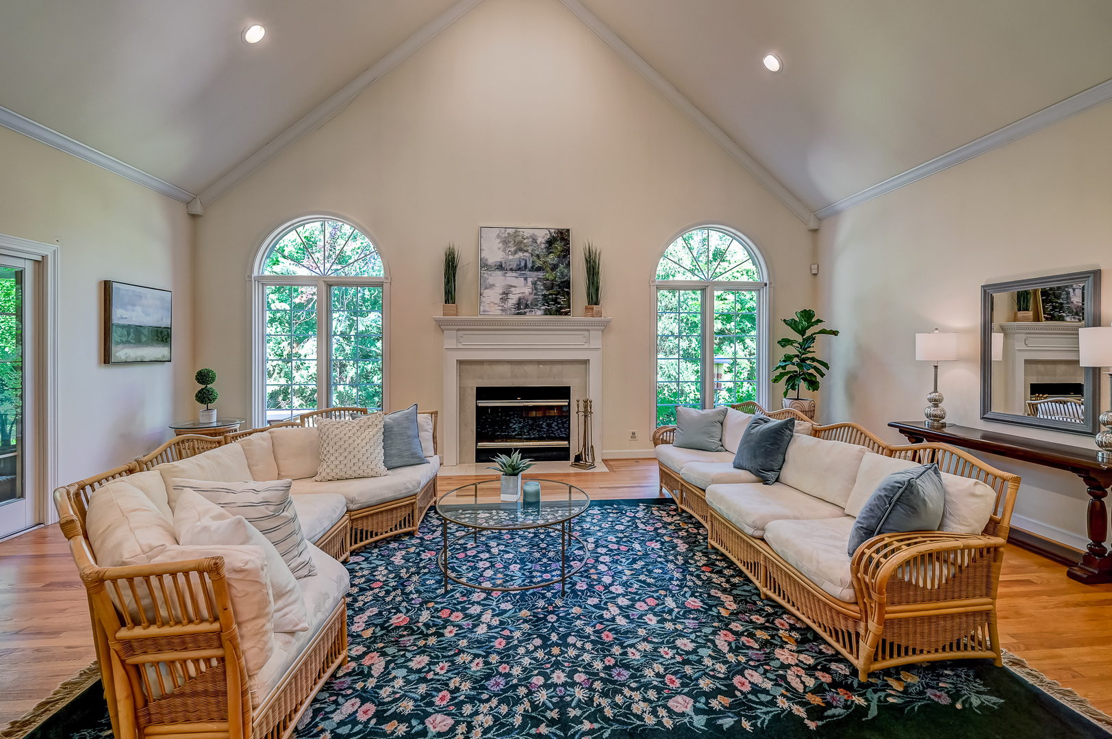 3 Berkshire Lane Burr Ridge, IL 60527 - Photo 8 of 40 a living room with furniture a large window and a fireplace