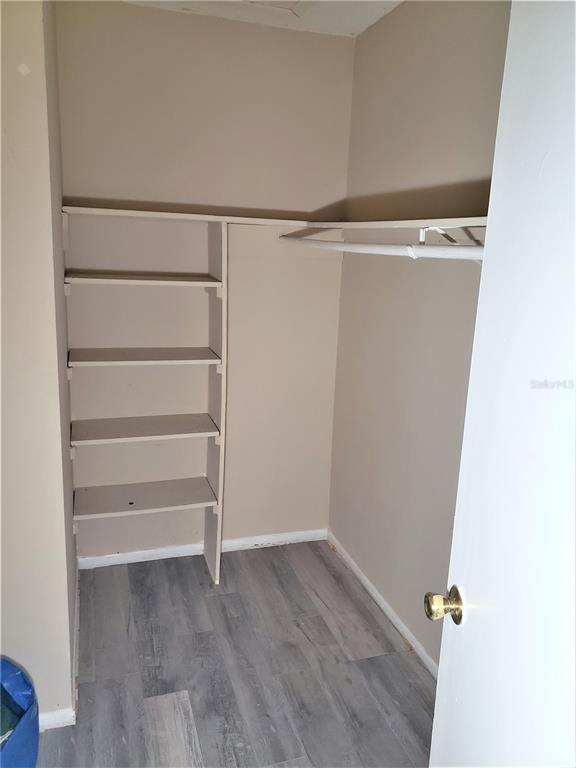 4151 South Semoran Boulevard, Unit 8 Orlando, FL 32822 - Photo 15 of 27 a view of an empty walk in closet