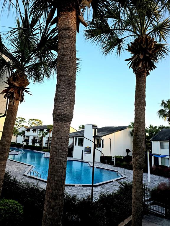 4151 South Semoran Boulevard, Unit 8 Orlando, FL 32822 - Photo 20 of 27 a picture of houses with outdoor space