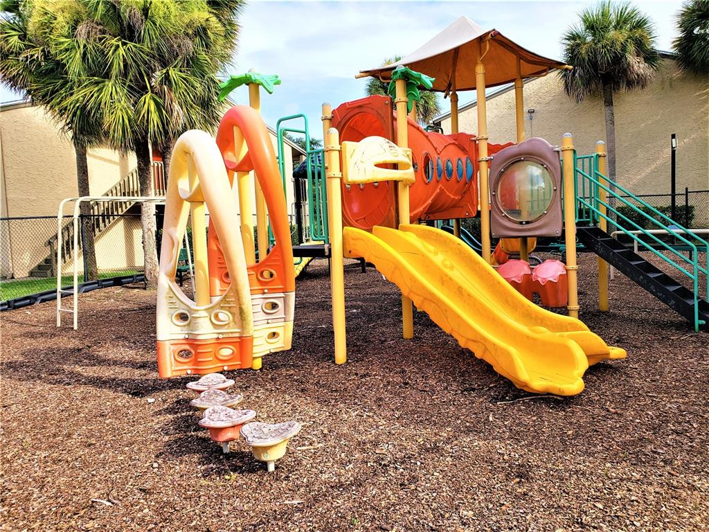 4151 South Semoran Boulevard, Unit 8 Orlando, FL 32822 - Photo 26 of 27 an outdoor space with seating