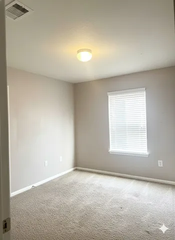 an empty room with a window