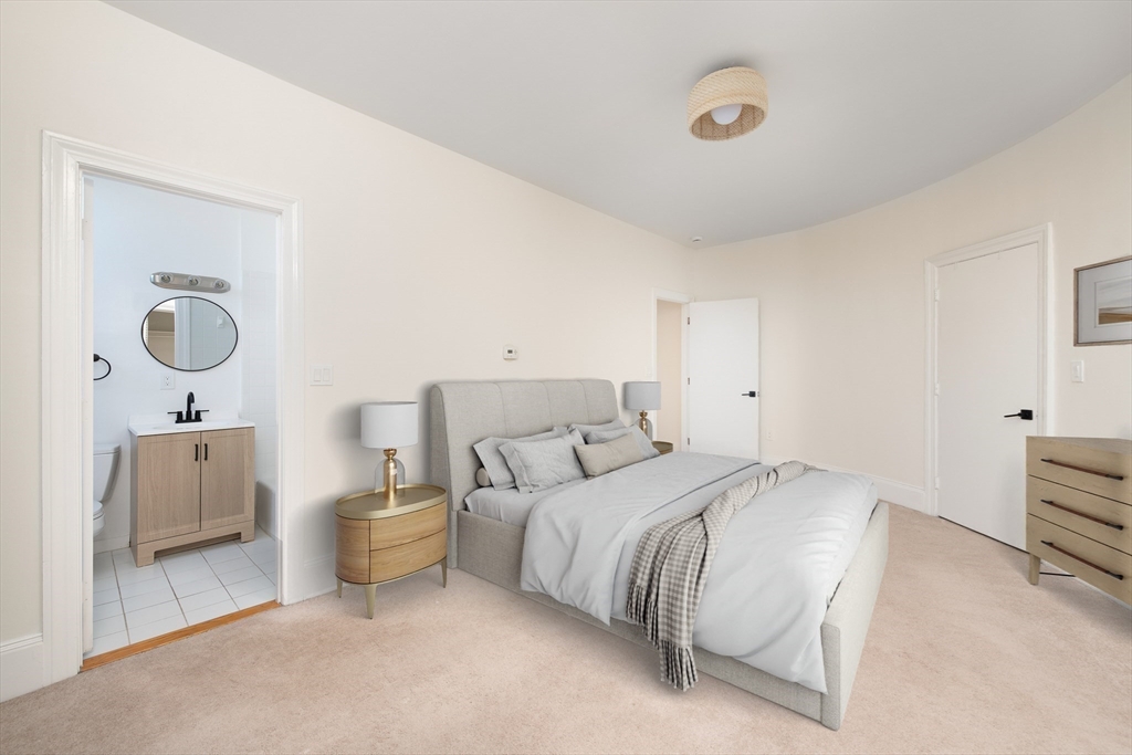 362 Commonwealth Avenue, Unit 4E Boston, MA 02115 - Photo 7 of 19 a bed room with a bed and a lamp