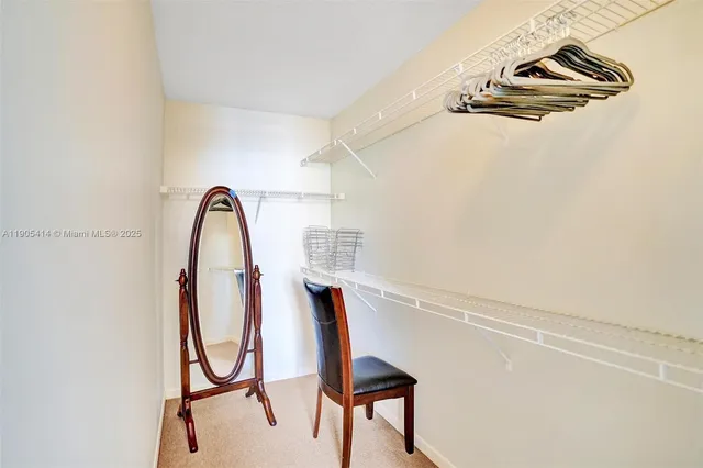 a view of a room with rack and hardwood view