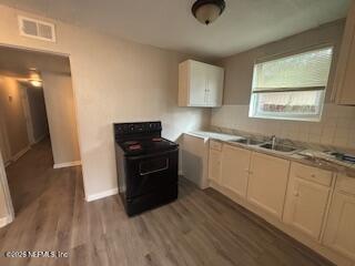 835 West 30th Street, Unit 1 Jacksonville, FL 32209 - Photo 2 of 8 a kitchen with granite countertop a refrigerator sink and stove