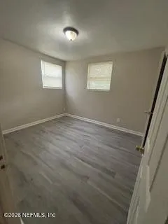 an empty room with windows