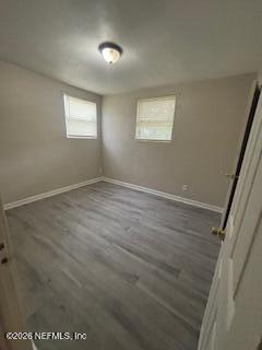 835 West 30th Street, Unit 1 Jacksonville, FL 32209 - Photo 5 of 8 an empty room with windows
