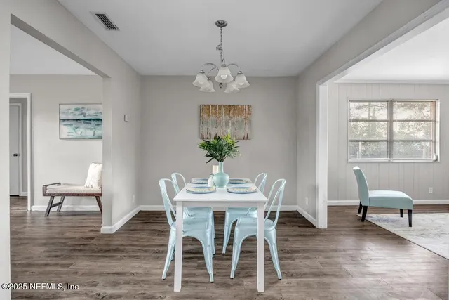 a view of a livingroom with furniture and window