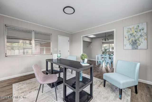 a kitchen with granite countertop a sink and a stove top oven