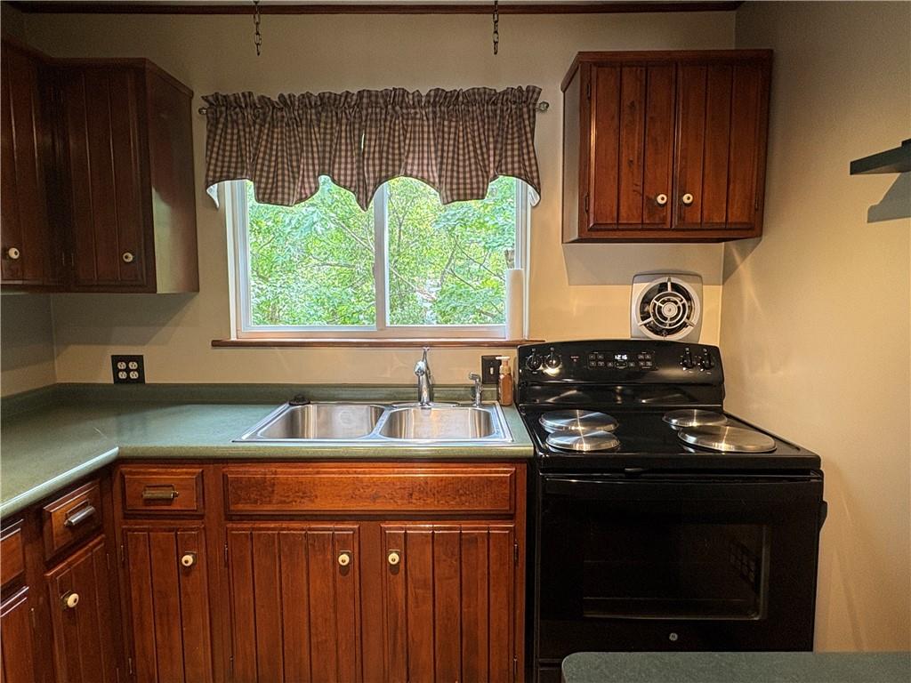 1082 Milltown Road Verona, PA 15147 - Photo 14 of 45 Kitchen with door to deck