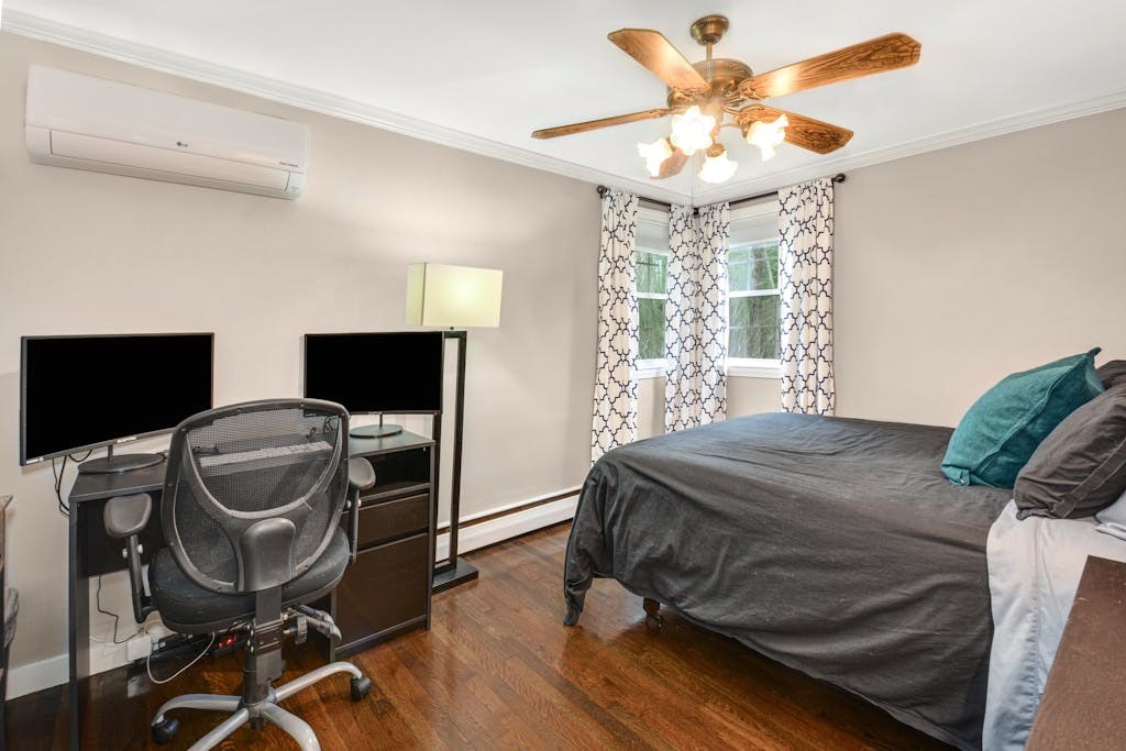 20 Oakview Circle Medway, MA 02053 - Photo 16 of 33 a bedroom with a bed and a flat screen tv