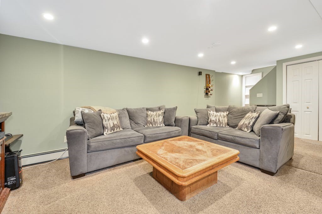 20 Oakview Circle Medway, MA 02053 - Photo 20 of 33 a living room with furniture a rug and a couch